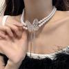 Collar de mariposa de diamante perlado de doble capa accesorios para vestidos de noche Cadena para clavícula de collar de temperamento de nicho de lujo ligero para mujer