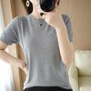 Suéter de algodón de cuello redondo de primavera y verano, camiseta de manga corta para mujer, suéter de temperamento de mujer moderno ins, suelto, comodín, camisa base al por mayor