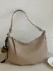 Bolsa estilosa de nicho Shuai Mi Jia para mulheres, novo modelo de verão 2026, bolsa simples tipo bolinho de ombro, bolsa de ombro e transversal