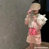 Bolso Litchi Shumai, elegante bolso cruzado para niña, diseño de nicho coreano, bolso de hombro para niña, pequeño bolso colgante para bebé.