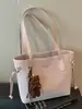 Bolsa tote grande de alta qualidade, modelo novo 2026, estilo retrô, para uso transfronteiriço, bolsa de ombro fashion, bolsa de mão de nicho da moda