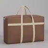 Bolsa de Mudança Grande Capacidade Espessada Não Tecida Impermeável Tecida Bolsa Doméstica Colcha Roupas Saco de Armazenamento Mochila Saco de Embalagem