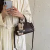 Bolso Canasta Versátil Estilo Coreano Súper Caliente para Mujer 2026 Nuevo Alta Calidad Mano de Obra Exquisita Comute Artículos Varios Bolso Tote Pequeño Bolso Cruzado