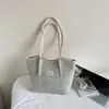 Bolsa de Ombro Feminina Listrada de Nicho Versão Coreana 2025 Moda Bolsa Saco de Grande Capacidade Bolsa de Mão Casual Moda Feminina