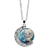 Cazador de demonios: Kimetsu No Yaiba Kamado Nezuko Collar de Luna Giratoria Periférico de Anime Colgante Giratorio de Doble Cara Cadena para Suéter
