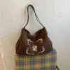 Bolsa de Ombro Grande Capacidade Estilo Étnico para o Dia a Dia Feminino Outono 2026 Nova Bolsa Tote de Ombro Retro Fosca de Alta Qualidade