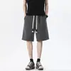 Pantalones cortos de jacquard de terciopelo de algodón europeo 2026 para hombre, estilo corto mejorado, jacquard texturizado, corte holgado, marca de moda, pantalones cortos casuales versátiles de cinco puntos
