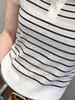Top de punto de manga corta con cuello polo a rayas de alta gama y elegante para mujer, nuevo Top hueco adelgazante de verano 2026