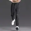 Pantalones deportivos para hombre para correr, pantalones de secado rápido para deportes al aire libre en primavera, entrenamiento de atletismo, pantalones casuales nuevos transpirables