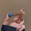 Presilha Lateral Exquisita e Doce Estilo Coreano para Mulheres 2025 Nova Presilha de Cabelo de Nicho de Alto Padrão com Franja e Acessório de Cabeça Elegante Versátil