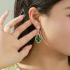 Xuping Moda Aleación de Cobre Chapado en Oro de 18 Quilates Serie de Piedras Gemas de Circonita Cúbica Sintética Pendientes de Lujo Ligero Esmeralda