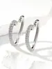 Pendientes retro dorados y encantadores de moda estilo coreano pendientes de diseño de celebridad de internet pendientes de circonita multicolor de temperamento elegante venta al por mayor