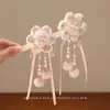 Diadema de Saludos de Año Nuevo para Niños Pasador Rojo con Lazo para Bebé Bola de Pelo con Borla Estilo Chino para Niñas
