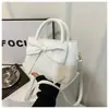 Bolsa Pequena com Laço para Mulheres 2024 Primavera Nova Estilosa Bolsa Saco Design de Nicho Feminina Bolsa de Ombro