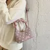 Bolso de nube de lunares estilo coreano para mujer, bolso de mano plisado, nuevo diseño de nicho 2026, bolso cruzado de moda y versátil para el día a día.