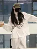 2025 Nova Moda Estilo Coreano Camiseta de Algodão Puro Manga Longa Solta Emagrecedora Feminina Versátil Gola Redonda Camisa Base de Verão Top