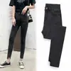 Nuevos pantalones vaqueros de talle alto y corte cropped para mujer para otoño e invierno, con un diseño asimétrico, corte ajustado y silueta de pierna de lápiz, que ofrecen un efecto adelgazante y elasticidad.