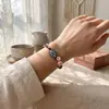 Europa Cruzada Mais Vendido Aquamarina Natural Pulseira de Corda Trançada à Mão Pedra Bruta Bolsa de Rede Estilo Floresta Pulseira de Guirlanda de Flores