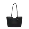 Bolsa tote de mão popular estilo coreano deste ano para mulheres, novidade Outono 2026, bolsa de ombro única tecida de cor sólida, para o trabalho, bolsa de axila
