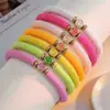 Pulsera de Cara Sonriente con Esmalte de Goteo de Venta Caliente Transfronteriza Europea y Americana Conjunto de Pulseras Apilables de Cerámica Suave Colorida Estilo Bohemio de Verano