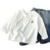Nueva camiseta de manga larga con cuello Henry para niños, niños y niñas, holgada y versátil, estilo coreano y británico, adecuada para primavera y otoño
