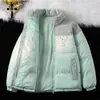 Ropa de Algodón Cálida a Prueba de Viento de Venta Caliente Transfronteriza para Hombre Otoño e Invierno Nueva Ropa de Algodón con Corduroy y Combinación de Colores Cuello Alto Ropa para Pareja