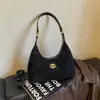 Nova Bolsa de Axila Fosca Outono/Inverno 2026 Bolsa Transversal Feminina de Luxo Leve Bolsa de Corrente Acolchoada Fashion para o Dia a Dia