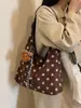 Bolso de mano de diseño de alta gama estilo coreano, lujo ligero con lunares, adecuado para ir al trabajo, casual y versátil, bolso de hombro y cruzado exquisito