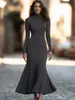 Vestido de punto estilo europeo y americano, de cuello alto, manga larga, estilo cola de pez, corte ajustado, elástico, bodycon, falda larga elegante