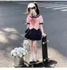 Conjunto de Verão para Meninas 2026 Novo Estilo Coreano para Meninas Mais Velhas, Estilo College com Laço Manga Curta e Saia em Camadas