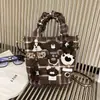 Bolsa Balde Infantil Popular de Desenho Animado Fashionável Feminina 2026 Nova Casual Retrô de Alto Valor Ombro Único Transversal