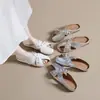 Mules cerrados de comercio exterior para mujer 2026 nuevo estilo de verano planos de suela blanda sandalias elegantes sin cordones caladas