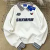 Moletom Gola Polo Xadrez Colorido Contrastante Unissex Inverno 2025 Lã Fleece Retrô Solto Falso Duas Peças Patchwork Top