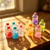 Botella Creativa de Acrílico con Aceite y Arena Movediza, Taza Luminosa, Colgante para Llavero, Accesorios para Coche, Adornos de Escritorio