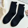 Calcetines de Velour Australiano Grueso con Etiqueta de Tela para Mujer, Colores Maillard, para Dormir, Media Pantorrilla, Confinamiento, Otoño e Invierno 2025, Venta al por Mayor