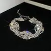 Pulseira Redonda Europeia e Americana Transfronteiriça com Borla e Cravejada de Diamantes, Pulseira Minimalista Moderna de Estilo Nicho com Design Único, Joia de Mão de Nicho