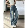 Jeans curvo rasgado de cintura baixa estilo americano para mulheres, versão fina de verão 2026, super popular, corte solto, calça wide leg destroyed que valoriza a silhueta