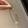 Anillo de Correr Dorado de Moda Pulsera de Oro Negro para Mujer Cadena Sencilla de Moda Estilo Chanel Pulsera Tejida Cepillada Brillante