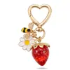 Nuevo llavero de TEMU transfronterizo lindo y dulce con forma de corazón para chica, con hebilla en forma de corazón, y colgantes de fresa, abeja y flor