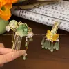 Grampo de cabelo super fada com franjas e lótus para primavera e verão, palito de cabelo estilo antigo para coque, novo pente de cabelo de folha de lótus verde estilo chinês para mulheres, acessório de cabelo Hanfu