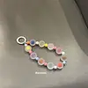 Estilo nuevo y popular transfronterizo Color dopamina hecho a mano con cuentas accesorios de moda de alta gama colgante versátil para teléfono móvil