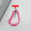 Estilo ins correa de teléfono tejida de color contrastante correa corta para la muñeca colgante de llavero de cámara CCD anti-pérdida unisex