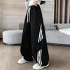 Calça Esportiva Infantil Feminina Primavera e Outono 2026 Novo Estilo Crianças Médias e Grandes Influenciador da Internet Calças Estilosas Calça Longa Fina Infantil Calça de Moletom Lâmina Curva