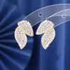 Diseño Minimalista Nuevos Aretes de Botón de Hoja con Microincrustaciones de Diamante Estilo Normcore Ins Pequeños y Versátiles Aretes de Hoja Tendencia Venta al por Mayor