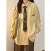 Camisa de alta calidad 2025 Primavera/Verano Nueva Llegada Estilo Universitario Retro Americano Corbata Color Sólido Versátil Para Vestir por Capas para Mujer Corte Holgado