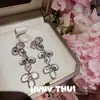 Brincos de Franja com Pedra Preciosa de Flor de Íris Retrô Combinação de Brincos de Pérola de Concha com Laço de Diamante para Banquete Alta Definição
