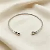 Brazalete Metálico Brillante Transfronterizo Nuevo Europeo y Americano Moda Nicho Pulsera de Brazo Abierta en Forma de Ola Decoración de Brazo Más Vendida Europea y Americana