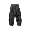 Conjunto Externo Três Provas Frota Negra: Conjunto de Duas Peças: Jaqueta com Gola Alta e Capuz Escondido e Calça Wide-Leg Patchwork Workwear