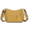Bolsa transversal versátil multicamadas de tecido Oxford leve, resistente à água, cor sólida, bolsa de ombro moderna para mulheres, adequada para viagens e deslocamento