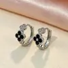 Brincos de trevo de quatro folhas europeus e americanos cravejados com zircônia colorida para mulheres, mais vendidos no exterior, luxo leve, alta qualidade, versáteis e estilosos